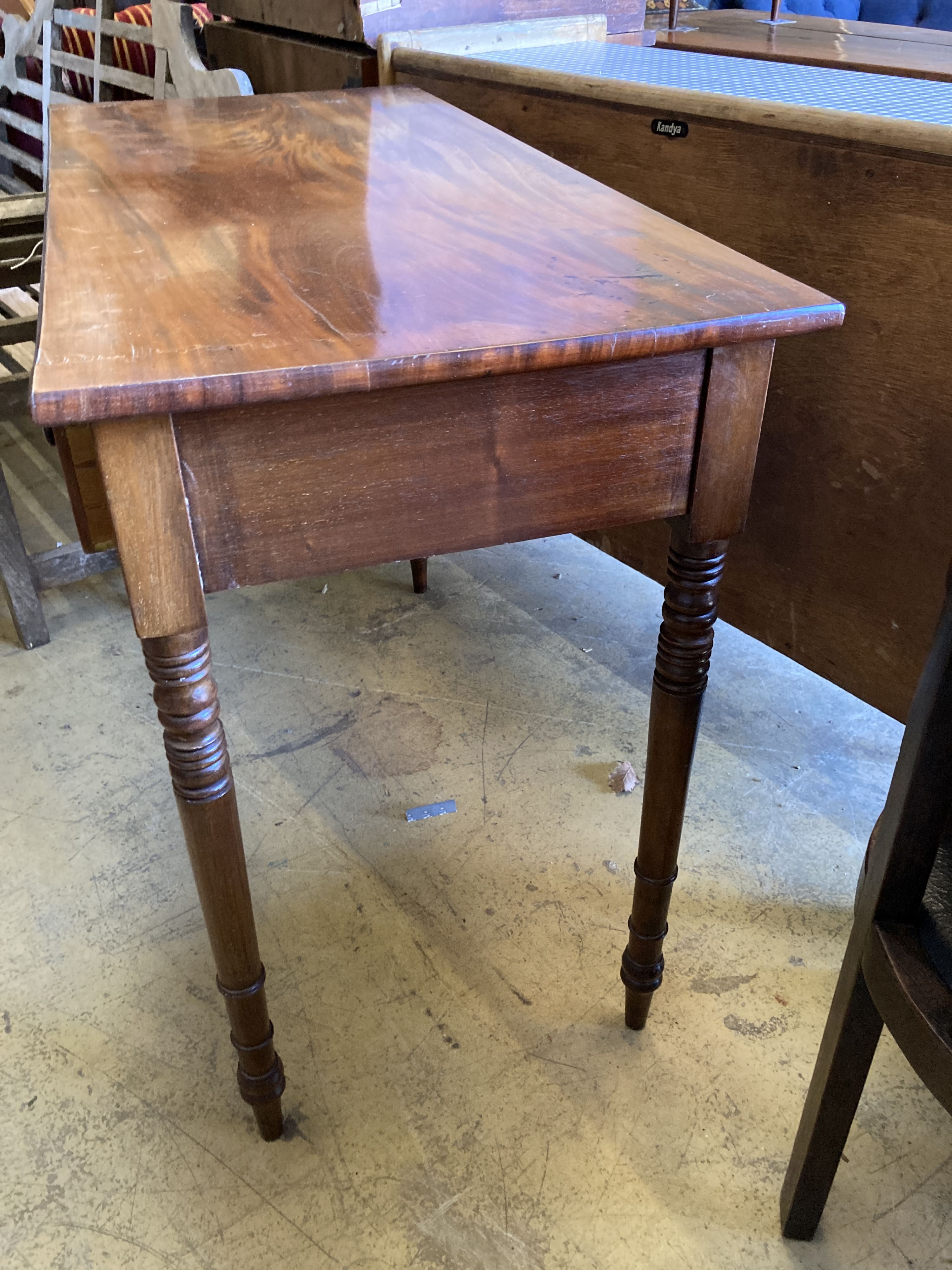 A mahogany Victorian two drawer side table, width 106cm, depth 49cm, height 82cm